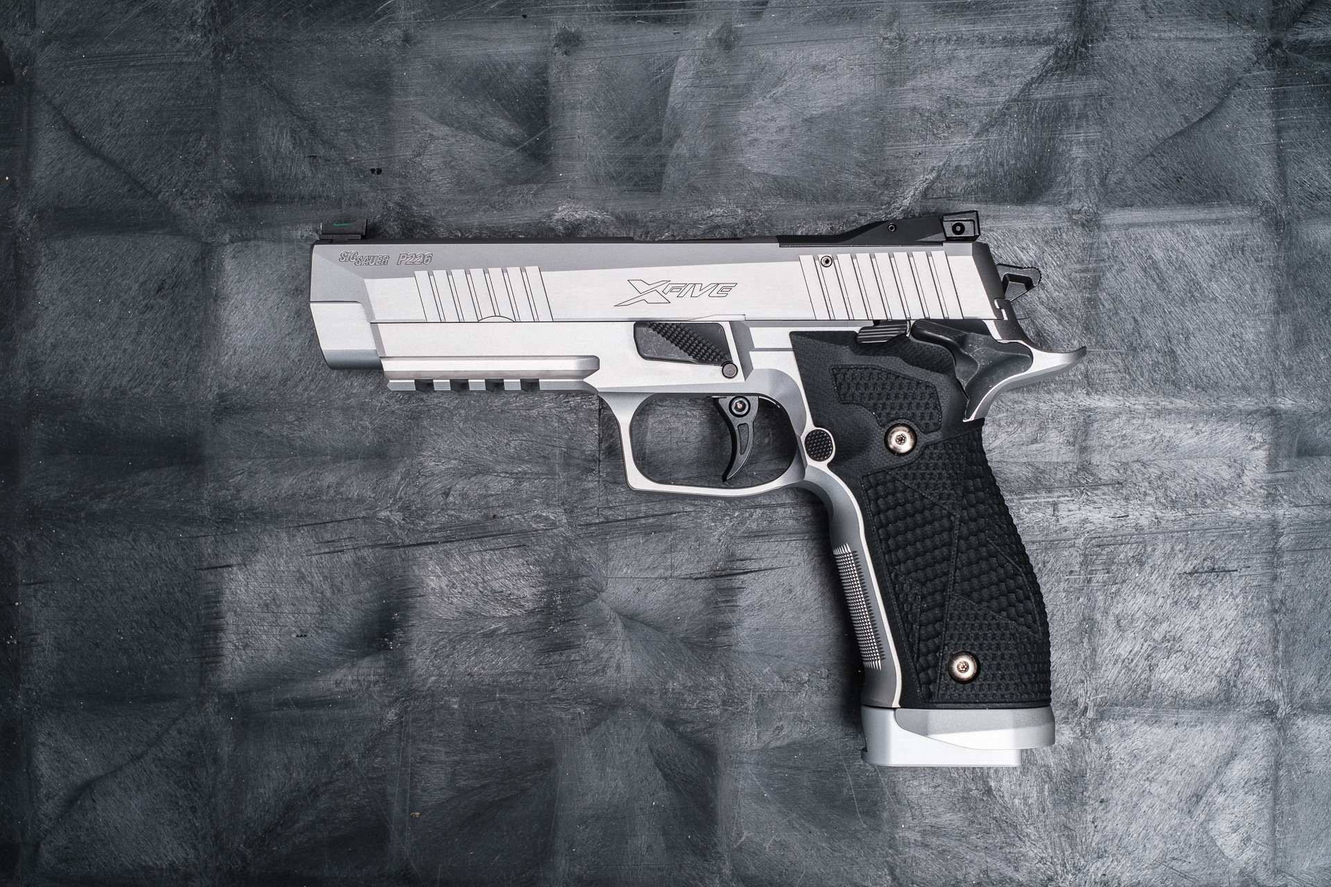 https://cityarsenal.com/product/sig-sauer-p226-x5-custom-9mm-pistol-sa-stainless-steel-frame-hogue-g10-piranha-grips-with-alloy-magwell-silver-226x5-9-stas/