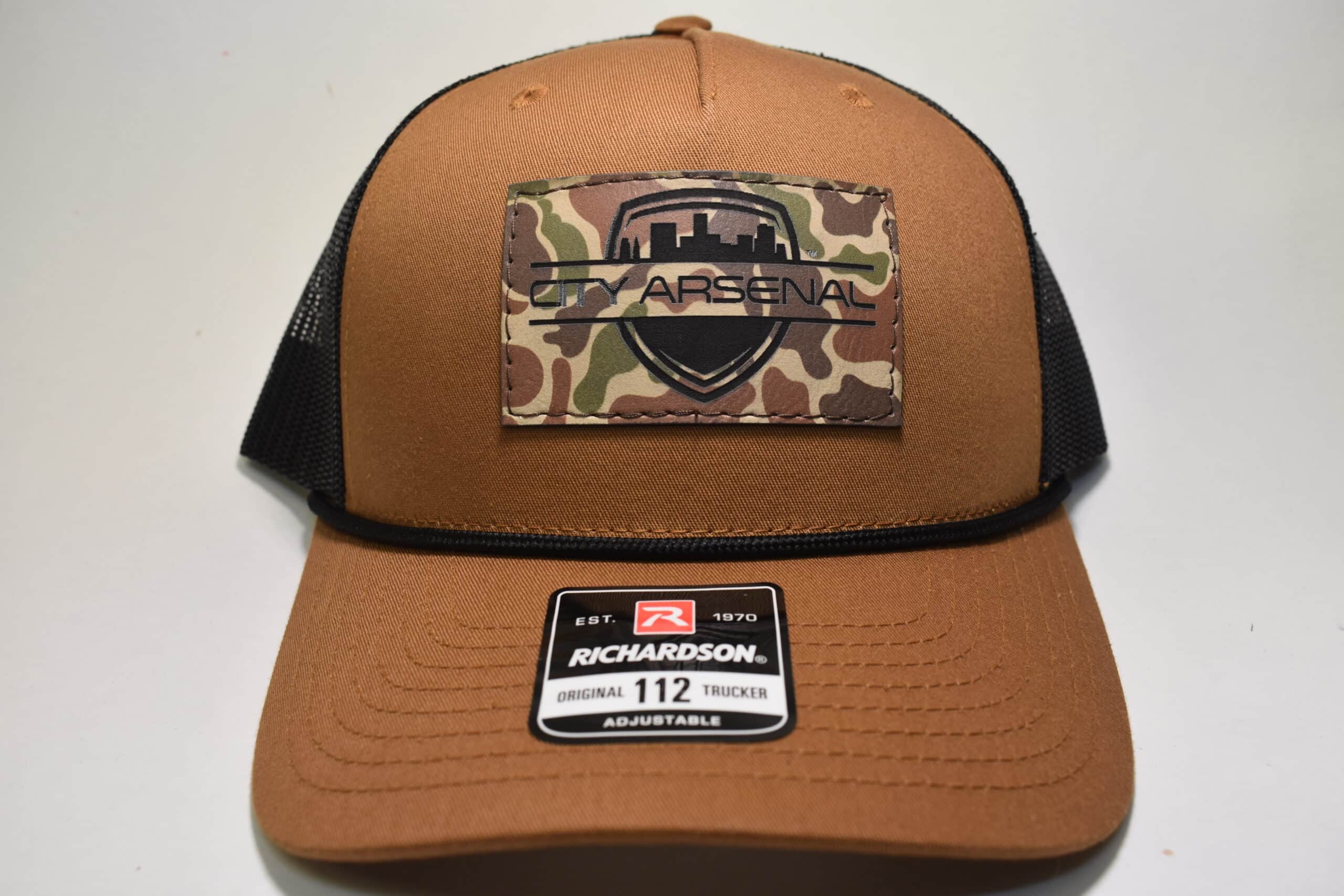 https://cityarsenal.com/product/city-arsenal-tan-original-richardson-112-trucker-hat-leather-duck-camo-brown-patch-ca-tan-duck/